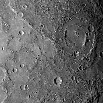 An image of lobate scarps (the line going diagonally from top left to bottom right) captured by the MESSENGER probe as it flew past Mercury. Also visible in the upper right is the Sullivan multi-ringed impact basin, approximately 135km in diameter