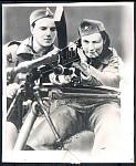 Wounded Yugoslav girl warrior learns to operate machine gun while convalescing in Malta.
