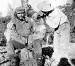 Che playing with peasant children, only hours before his capture